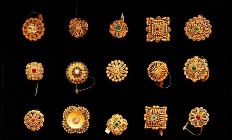 Gold heads for 5th weekly gain with focus on US policy path after Fed action