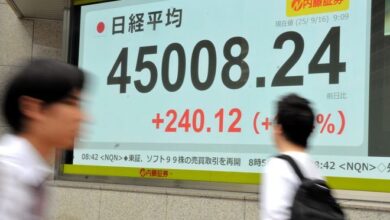 Global shares mostly rise after Wall Street sets new records