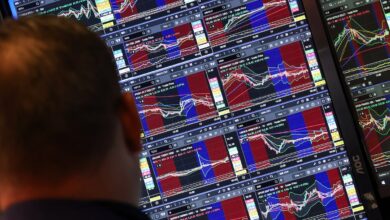 Stocks end lower as investors turn cautious ahead of interest rate decisions