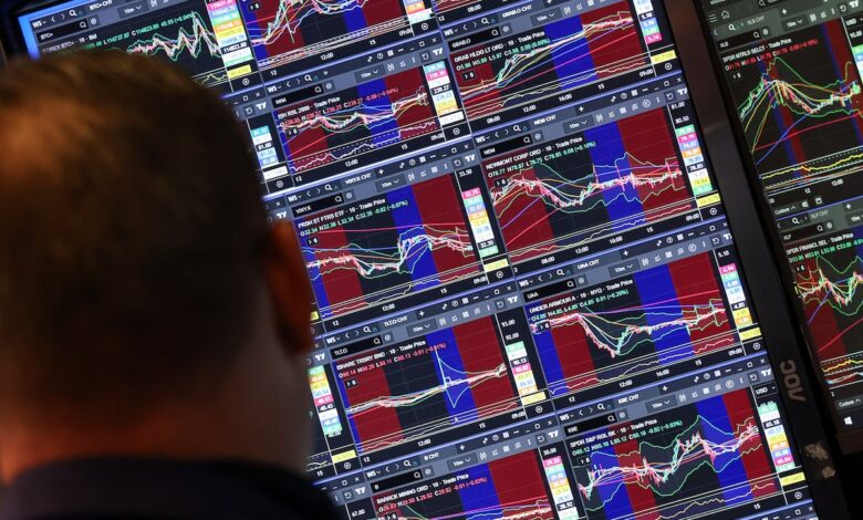 Stocks end lower as investors turn cautious ahead of interest rate decisions