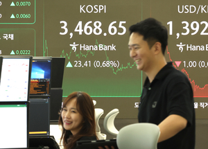 Seoul shares renew record high on tech rally