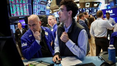 Stocks pressured by Fed rate cut doubts, new Trump tariffs