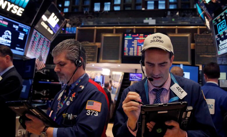 US stocks end higher, Treasury yields rise on easing credit, trade worries