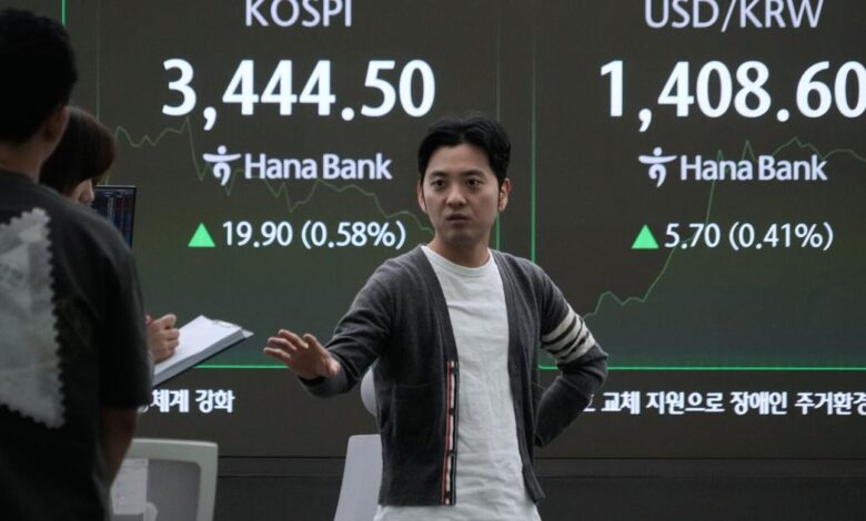 Wall Street sets more records, but bond yields drop following discouraging data on the job market | National News