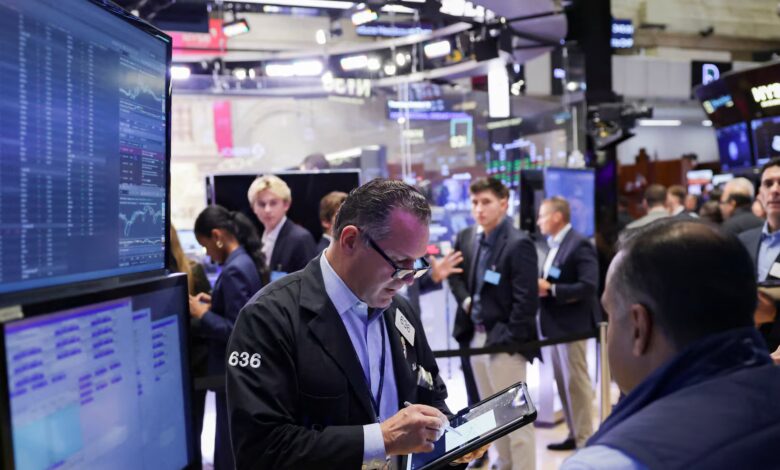 U.S. stocks pulled lower by financials; gold hits record highs