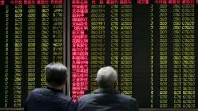 Stocks rise on upbeat earnings; Russia sanctions boost oil
