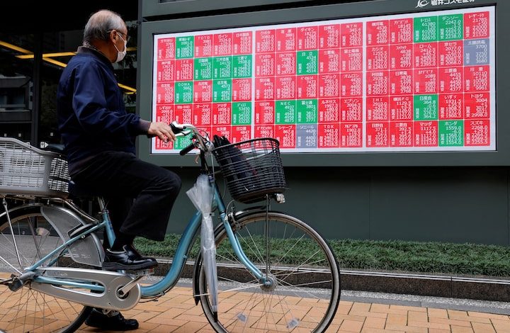 Global stocks rally on rising chances of fed rate cut; dollar steady