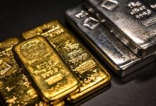 Gold rebounds above ,000 an ounce; silver snaps back after wild swings