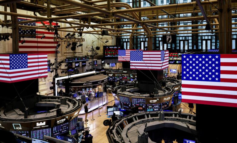 Stocks edge up on Amazon boost, dollar rises after Fed comments