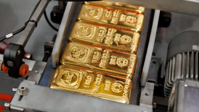 Gold Little Changed as Traders Eye Outlook for Fed Rates