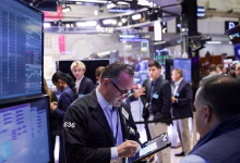 Nasdaq ends slightly up, S&P 500 flat as Fed brings little surprise