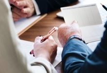 A Look At Popular (BPOP) Valuation As Analyst Upgrades And Earnings Momentum Lift Sentiment