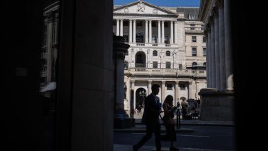 Global stocks fall as traders await Amazon earnings and digest central bank decisions