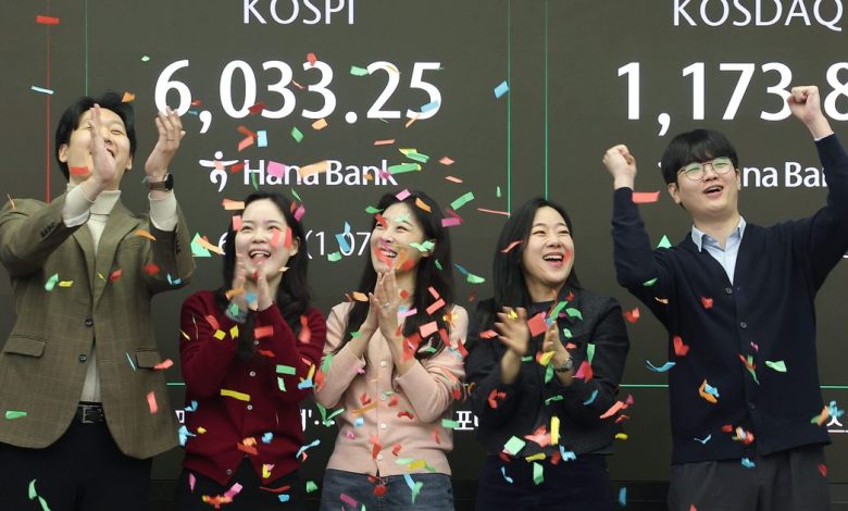 US futures are flat and global stocks gain after optimism about AI sends Wall Street higher :: WRAL.com