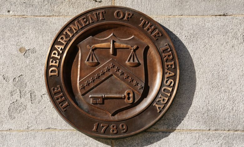 Trendsetting U.S. bond yield slides under 4%, marking its largest monthly decline in a year