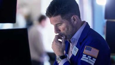 Asian shares are mixed, US futures edge higher as AI fears drag Wall Street lower