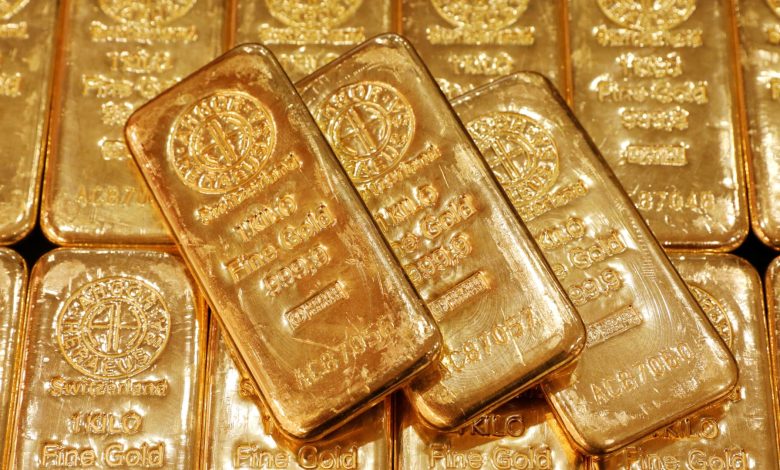 Gold eases on firmer dollar as investors await clarity on U.S.-Iran talks