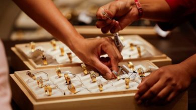 Gold rises as lower oil prices ease inflation fears