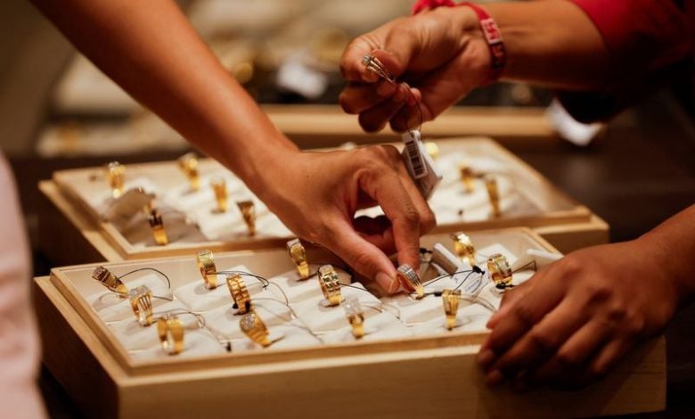 Gold rises as lower oil prices ease inflation fears