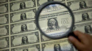 World stocks mixed, dollar down as investors digest US job growth, chipmaker strength and elevated oil