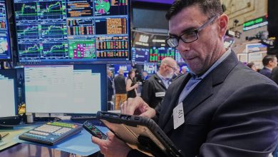 Apple leads Wall Street toward more records as oil prices pull back