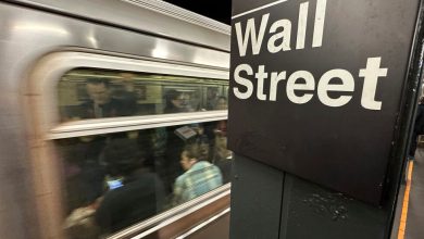 US futures gain and Asian shares slip as oil prices fall back