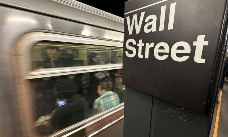 US futures gain and Asian shares slip as oil prices fall back