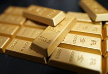 Gold hits over three-month high on dollar weakness, Treasury bond buyback plans