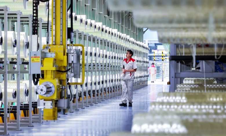 China factory activity grows faster than expected in June on tech export demand