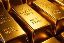 Gold poised for fourth weekly loss as hawkish Fed bets buoy dollar
