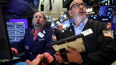 Wall St gains as chips rebound, Middle East tensions ease
