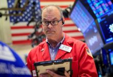 S&P, Nasdaq end lower on semiconductor selloff as AI spending concerns mount