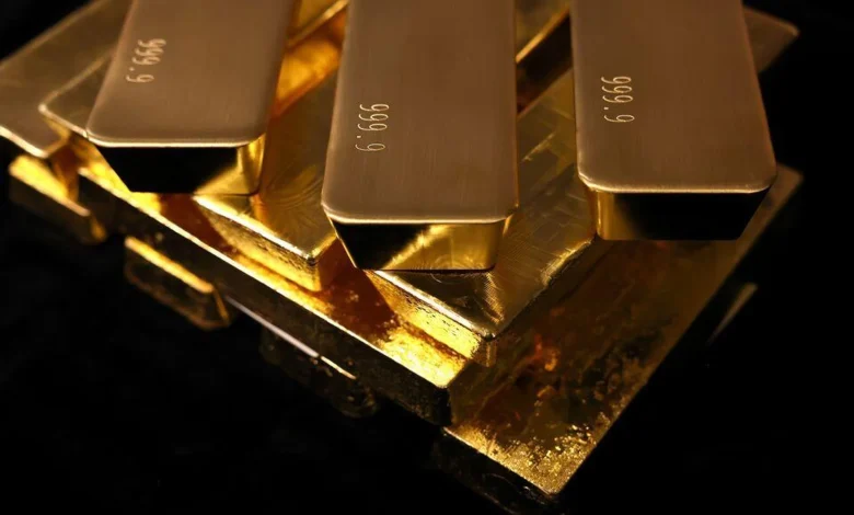 Gold falls as hawkish US Fed stokes 2026 interest-rate hike wagers