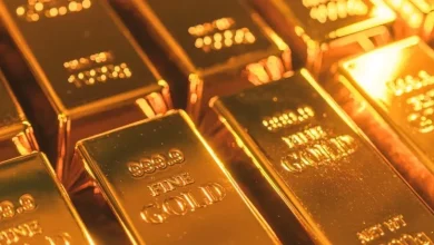 Spot gold extends losses, falls over 3% to ,336 per ounce as strong jobs data rattles markets