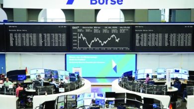 Global stocks climb as US jobs data cools Fed hike fears