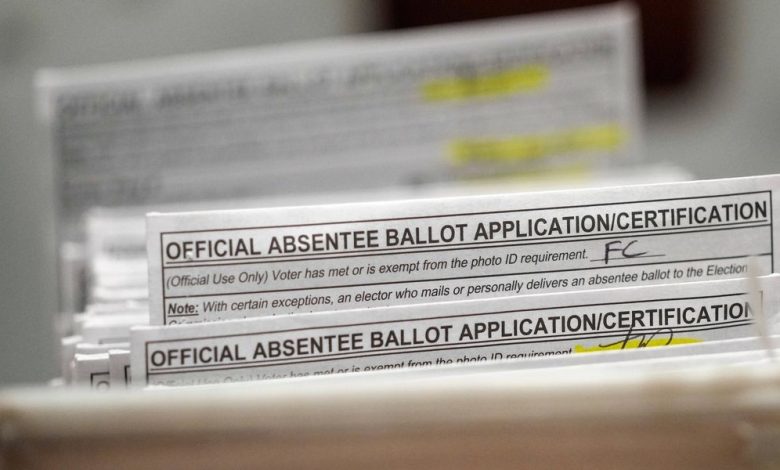 Wisconsin voters begin casting ballots at the polls in chaotic Democratic governor’s race
