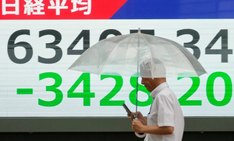 Asian shares sink, with Tokyo down nearly 5% as slumping AI stocks drag world markets lower Asian shares sink, with Tokyo down nearly 5% as slumping AI stocks drag world markets lower
