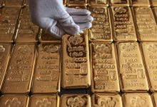 Gold hits near two-week low on Fed chief’s hawkish stance