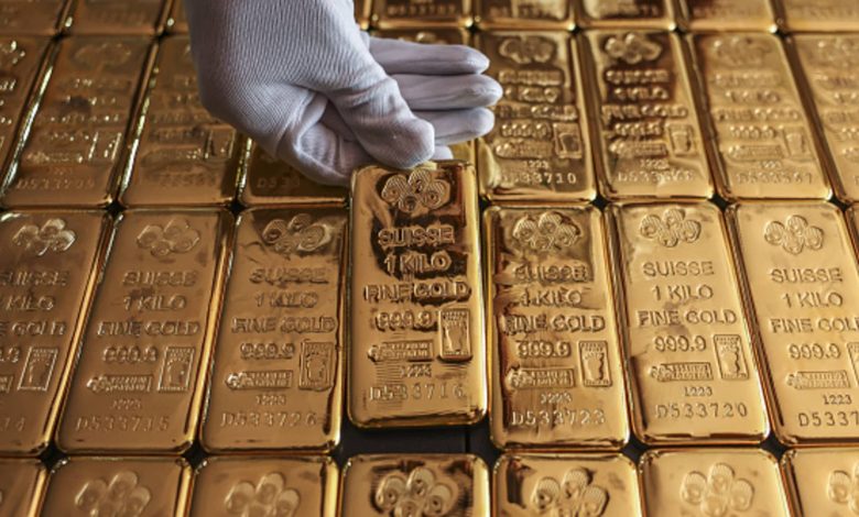 Gold hits near two-week low on Fed chief’s hawkish stance Gold hits near two-week low on Fed chief’s hawkish stance
