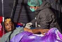 Thousands evacuated after Indonesia quake kills 51, cuts roads