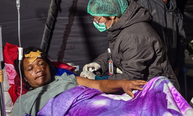 Thousands evacuated after Indonesia quake kills 51, cuts roads Thousands evacuated after Indonesia quake kills 51, cuts roads