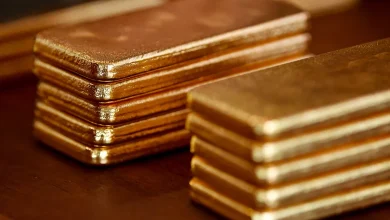 Gold climbs as US dollar softens; STI slips on SATS drag Gold climbs as US dollar softens; STI slips on SATS drag