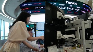 US stocks jump as employers unexpectedly cut 23,000 jobs, raising hopes that rate hikes can wait