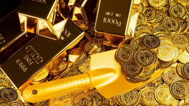 Gold futures rise above ,700 per ounce on COMEX
