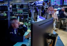 S&P 500 notches record-high close as rate-hike worries ease