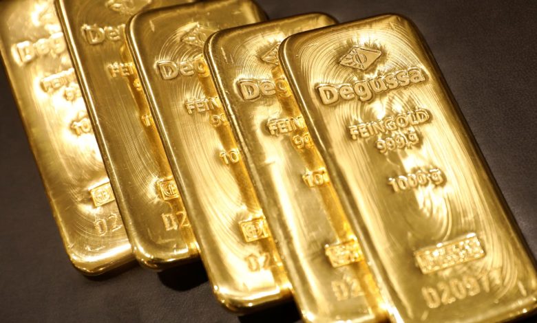 Gold eases as robust U.S. payrolls boost rate-hike bets