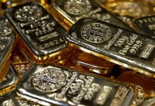 Gold muted as Fed policy tightening prospects weigh