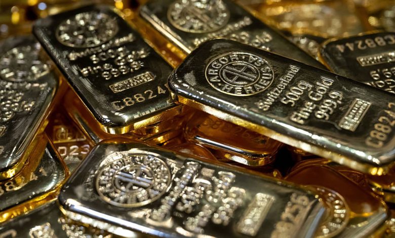 Gold muted as Fed policy tightening prospects weigh