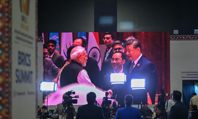 Indian Prime Minister Modi says border peace is key to India-China ties Indian Prime Minister Modi says border peace is key to India-China ties