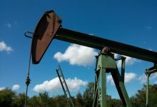 Oil prices leap to their highest in months, drag Wall Street lower